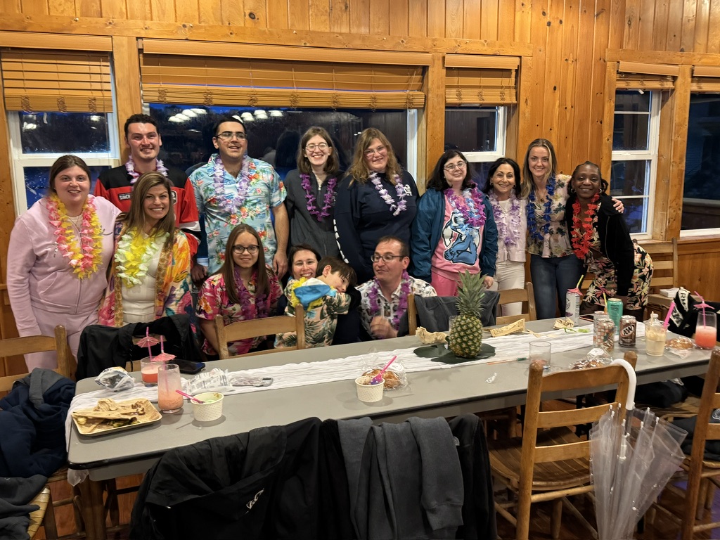 Friends celebrating together at a themed dinner
